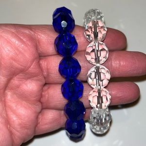 NWOT 2 fun large plastic bead bracelets.Beautiful blue & clear beaded bracelets.